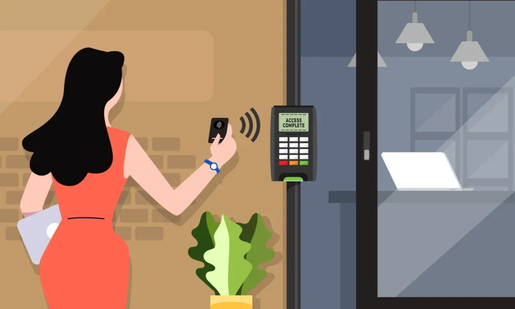 Employee using digital attendance system in office
